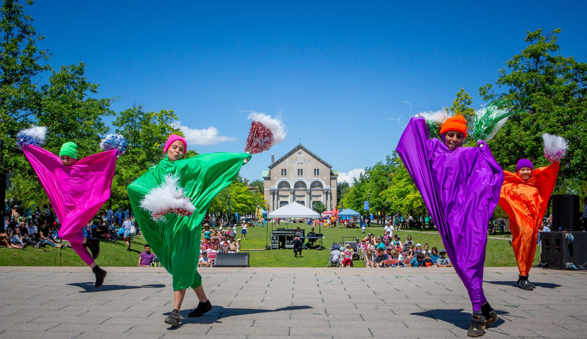 Colorful dance performance in the Quartier culturel des Faubourgs, located in the Centre-Sud neighborhood of Montreal.