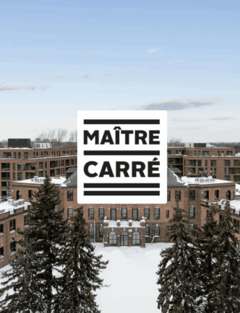 A snowy courtyard surrounded by a modern, brown brick apartment building with evergreen trees in the foreground. The logo MAÎTRE CARRÉ is centered over the image.